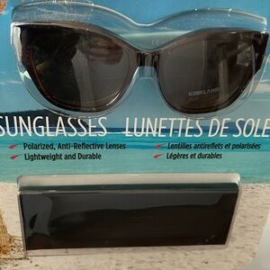 Brand new! Kirkland polarized sunglasses. Anti-reflective, lightweight with case